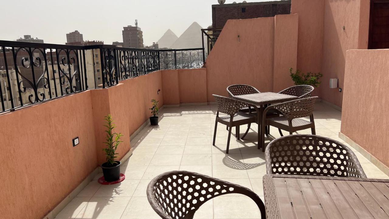 Pyramids Road Guest House Cozy Rooms And Rooftop Breakfast With The Pyramids View Nazlet el-Sîsi Exterior foto